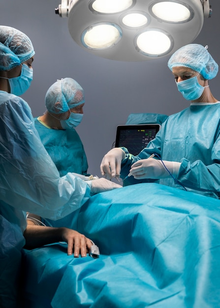 Doctors performing a surgical procedure